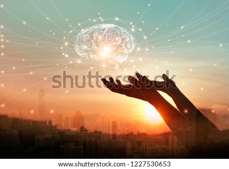 Abstract palm hands touching brain with network connections, innovative technology in science and communication concept 