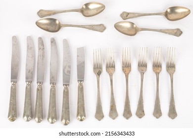 Abstract Pastel Background Image Made Of Silver Antique Home Kitchenware Objects Cutlery Composition On White Backdrop Buying Now. 