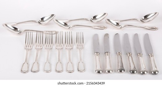 Abstract Pastel Background Image Made Of Silver Antique Home Kitchenware Objects Cutlery Composition On White Backdrop Buying Now. 