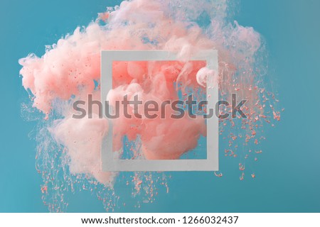 Abstract pastel coral pink color paint with pastel blue background. Fluid creative concept composition with copy space. Minimal natural luxury.