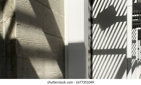 Abstract pattern created by shadows on exterior concrete walls