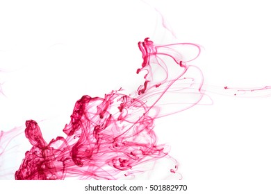 Abstract pattern falling into the water drop of red ink