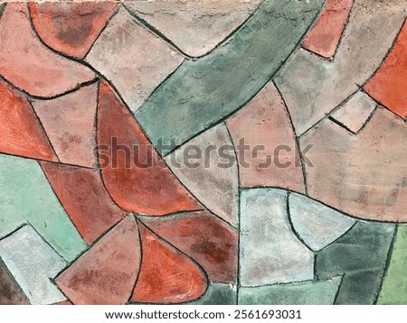 Abstract pattern with irregular geometric shapes. Fence wall The colors used include red, green, gray, and black, giving an artistic and attractive impression.