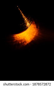abstract pattern on the wall, beautiful orange shadows on the dark wall from the play of lantern rays