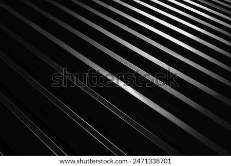 Abstract pattern texture Background. sheeting on the roof closeup red metal roofing geometric lines diagonal stripes. Shades of 