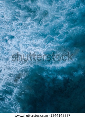 Abstract pattern view of white wave foam.