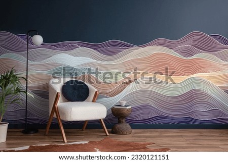 Abstract pattern wall decal or wallpaper on dark blue wall with white chair, cushion with side table and plant.