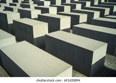 Abstract pattern/Concrete blocks in a maze like arrangement under the sunset light creating an abstract play of light and shadows.