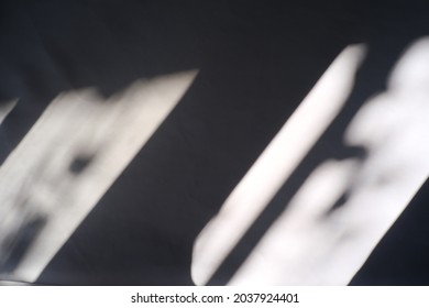 Abstract patterned blur background from the reflection of sunlight and shadows