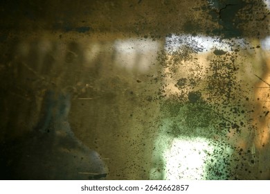 Abstract patterns and reflections on the surface of a dirty mirror                              