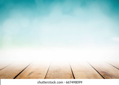 Abstract Perspective Soft Wooden Table Top On Desk Grocery Background Texture Product Pub Floor On Blue Nature Beach Water. Christmas Lunch Breakfast Food Garden Summer Pastel Teal Bokeh Turquoise.