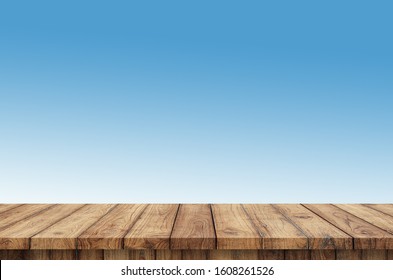 Abstract Perspective Wooden Table Top View On Blur Grocery Background Concept For Product Mock Up Pub Floor On Blue Nature Beach. Christmas Lunch Breakfast Wallpaper In Summer Pastel Teal Turquoise.