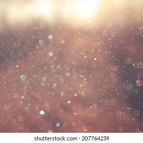 abstract photo of light burst and glitter bokeh. image is blurred and filtered . 