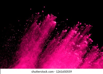 Abstract pink powder splatted background,Freeze motion of color powder exploding,throwing color powder on background.