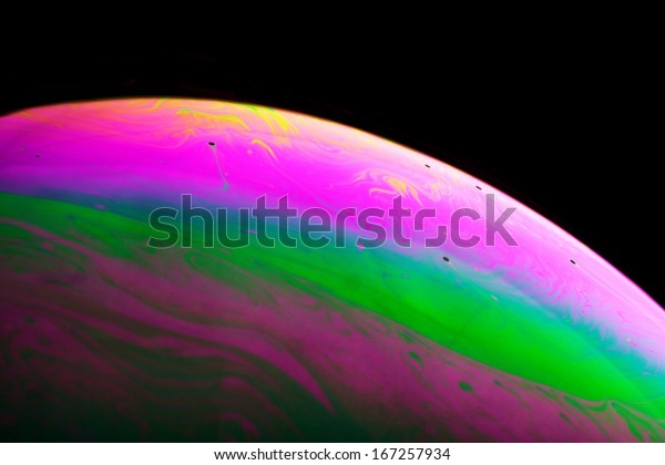 Abstract planet,\
colorful background close\
up