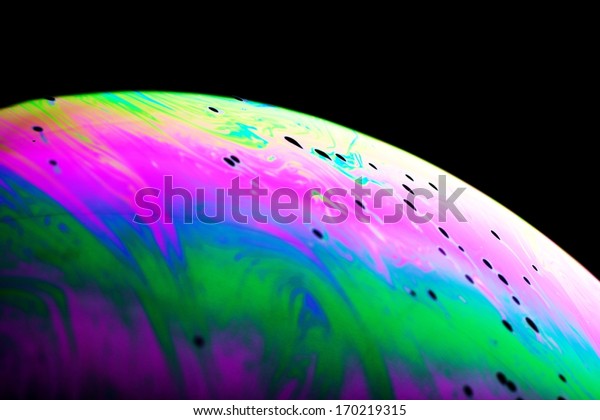 Abstract planet,\
colorful background close\
up