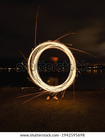 abstract portrait with lightrays and circles