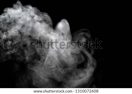 Abstract powder or smoke isolated on black background
