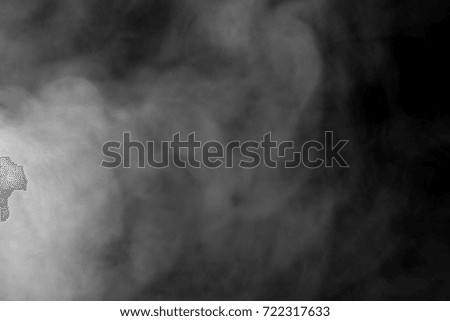 Abstract  powder or smoke isolated on black background,Out of focus 