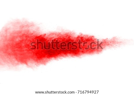 abstract powder splatted background. Red powder explosion on white background. Colored cloud. Colorful dust explode. Paint Holi.
