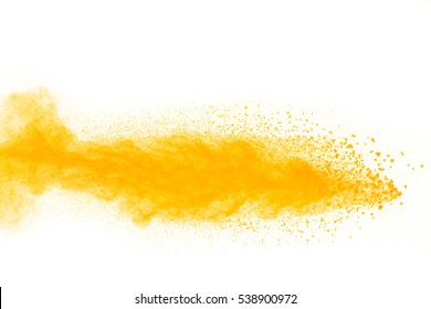 abstract powder splatted background,Freeze motion of yellow powder exploding,throwing orange dust on white background.