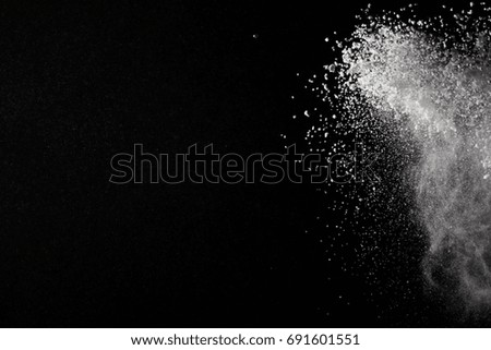abstract powder splatted background,Freeze motion of color powder exploding/throwing color powder,color glitter texture on black background