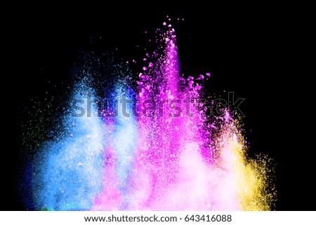 abstract powder splatted on black background,Freeze motion of color powder exploding or throwing color powder, multicolored glitter texture.