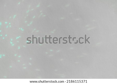 .Abstract prism reflection, rays leaking through lens effect. Crystal light reflections for overlay mockup on light background. Rainbow holographic shadow mock up, iridescent prismatic wallpaper