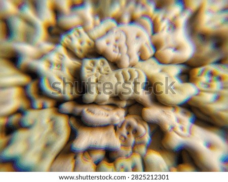 Abstract psychedelic pattern of dog and animal crackers with chromatic aberration and distortion effect. Surreal food art background.
