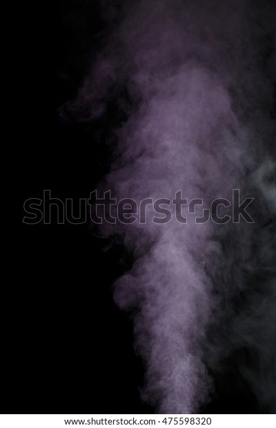 Abstract
purple water vapor on a black background. Texture. Design elements.
Abstract art. Steam the humidifier. Macro
shot.