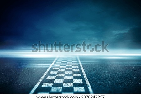 Abstract Race track finish line racing on light night