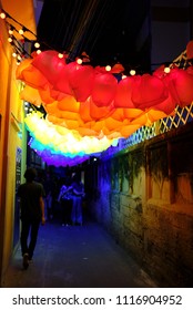 Abstract Rainbow Art Installation In The Dark Alley.