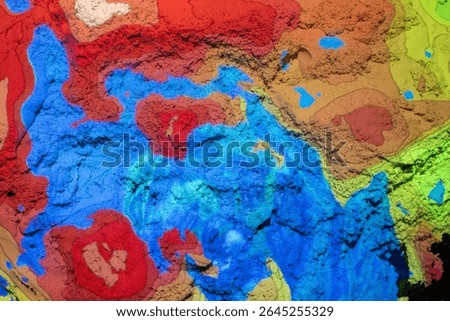 The abstract , random colours and textures from an augmented reality sandbox. 