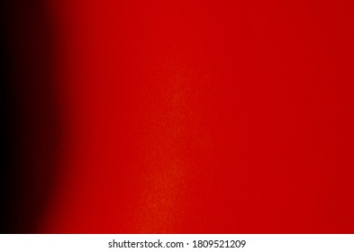 Abstract red background with gradient transitions and shadows. Multi-tasking background for variety of design tasks. Design, decoration, advertising.