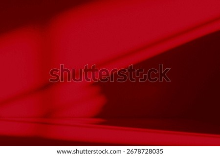 Abstract red background with shadow light effect on wall studio interior for product display Chinese New Year celebration, Christmas theme,Valentine’s Day design,festive decoration,modern marketing