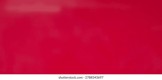 Abstract red background with smooth surface texture and soft gradient. Minimalist monochrome backdrop suitable for design projects, presentations, advertising materials, and modern graphic compositions.