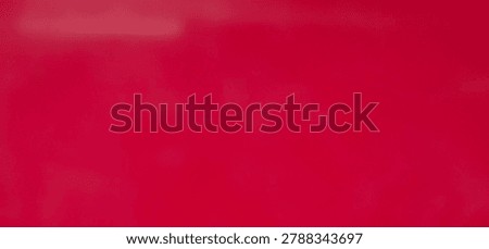Abstract red background with smooth surface texture and soft gradient. Minimalist monochrome backdrop suitable for design projects, presentations, advertising materials, and modern graphic compositions.