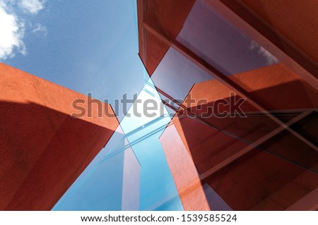 Abstract red building blue sky