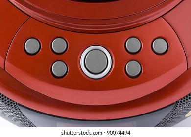 Abstract red control panel from plastic with a rough surface. Mass production electronic device background.  Selective focus