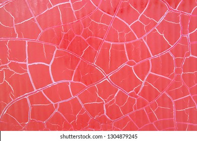 Abstract red cracked blackground.Crazed textured from red wall. 