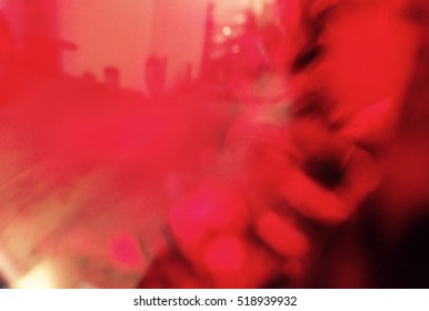 Abstract Red Light Leak Out Of Focus Blur For Background