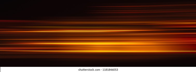 Abstract red light trails in the dark background - Shutterstock ID 1181846053