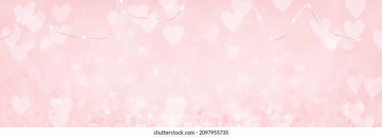 Abstract Red Pink Heart Glitter Light Bokeh Holiday And Festive Party Background. Tender Wire Lights String On Top. Love Sentiment And St Valentine's Day Concept Backdrop Banner With Copy Space