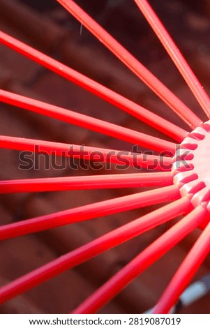 Abstract Red Plastic Rake Tines Pattern