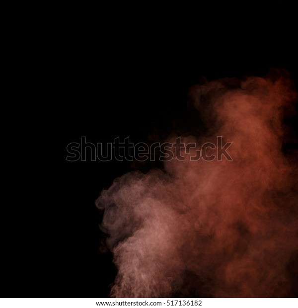 Abstract red water vapor on a black background.\
Macro shot.