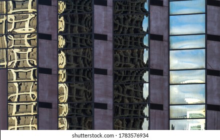 Abstract reflections from windows and surfaces of skyscraper
