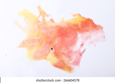 abstract remaining eaten yellow passion fruit and red strawberry ice cream scoops on white background