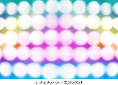 Abstract retro rainbow pink blue green yellow color bokeh lights happy birthday party background invite, 80s disco club concert 1980s night karaoke show, girl dance music or girly unicorn pony texture - Powered by Shutterstock