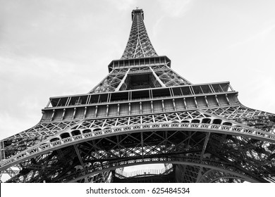 An abstract retro view of an Eiffel Tower against Sun in black and white colors, Paris, France
