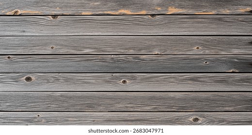 Abstract rustic background of weathered barn wood, muted gray and brown tones with rough grain, creating a timeless natural minimal wallpaper.
